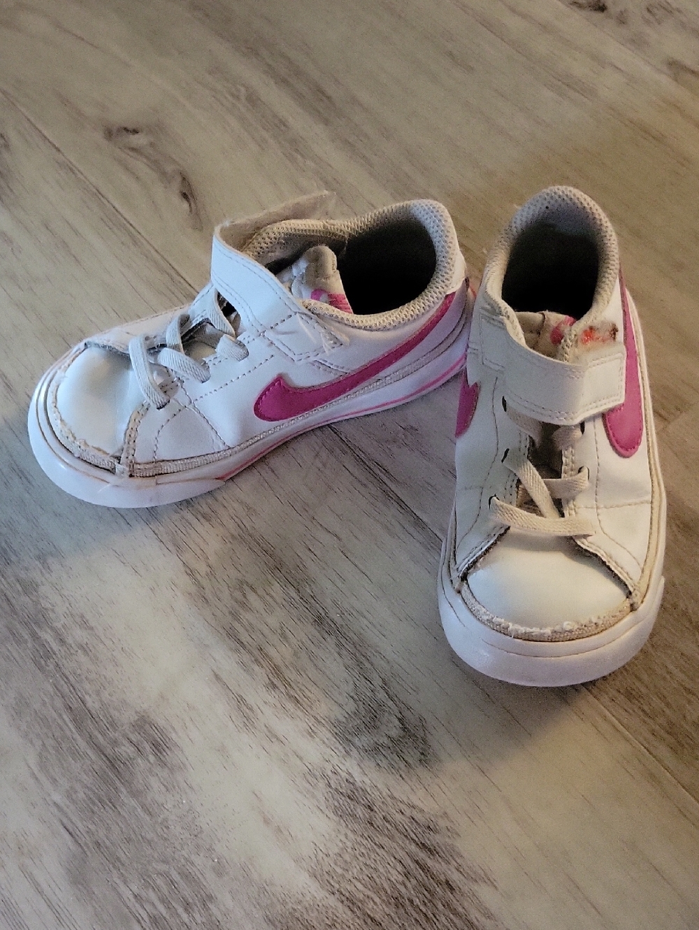 Nike Kids White Sneakers with Pink Swoosh